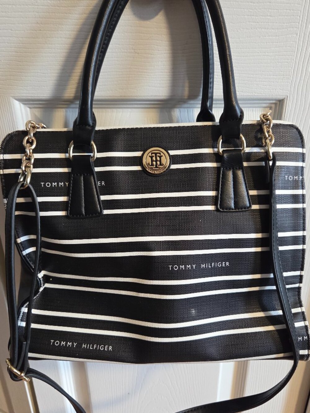 Tommy Hilfiger. black and white striped purse